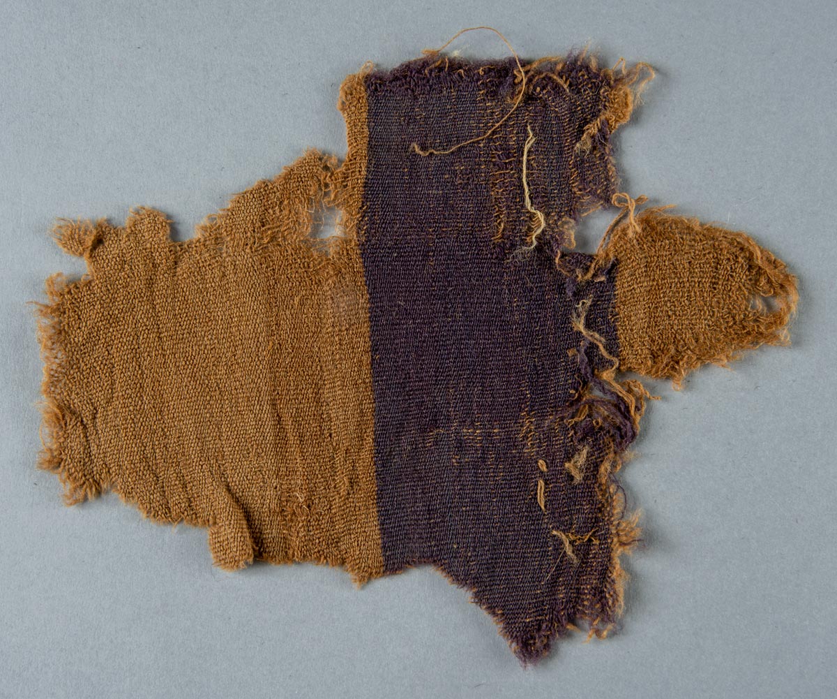 Textile fragment, undyed except for a purple stripe