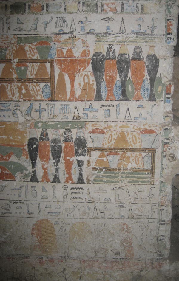 Wall of burial chamber with offering inscription invoking Anubis