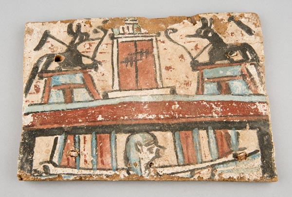 Coffin panel showing two jackals and goddess