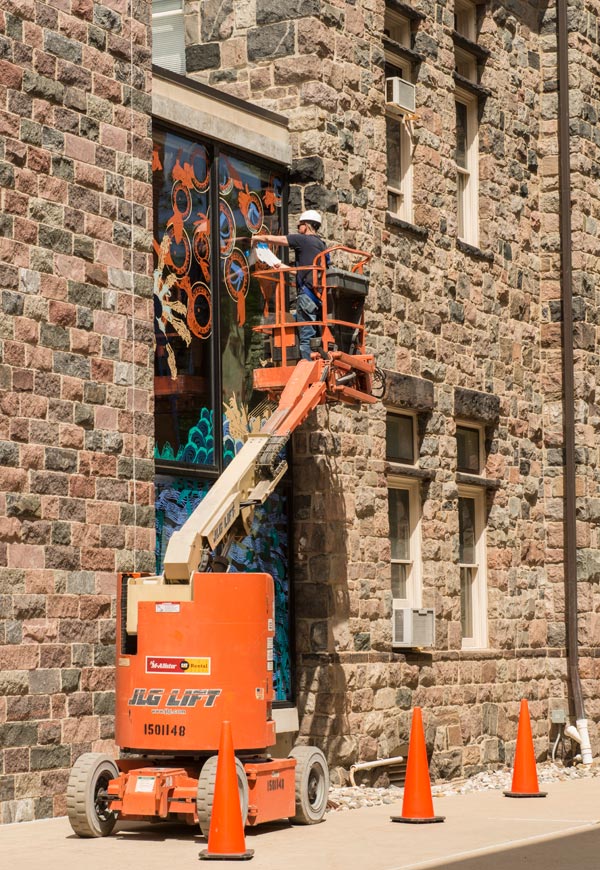 Jim Cogswell working on the connector windows