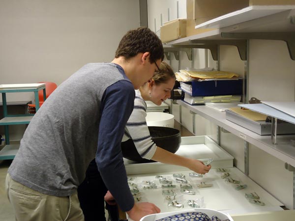 Students selecting objects for the exhibition