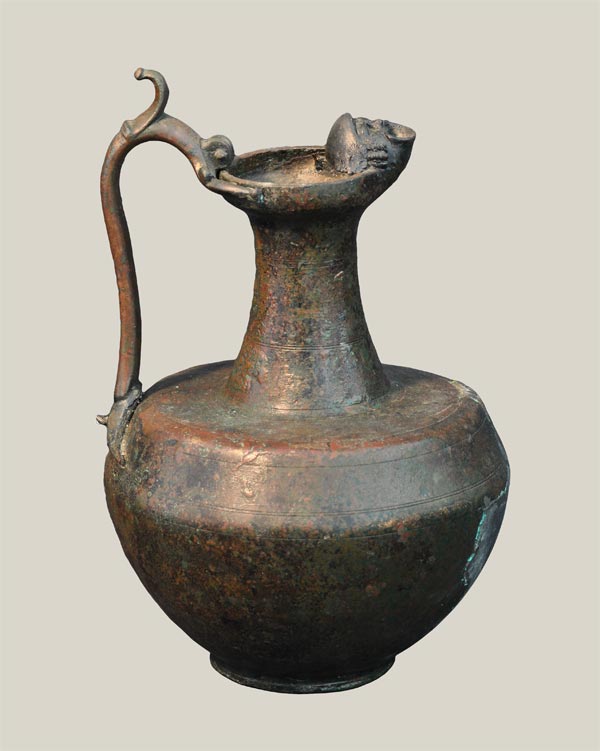 Bronze pitcher with comic mask spout