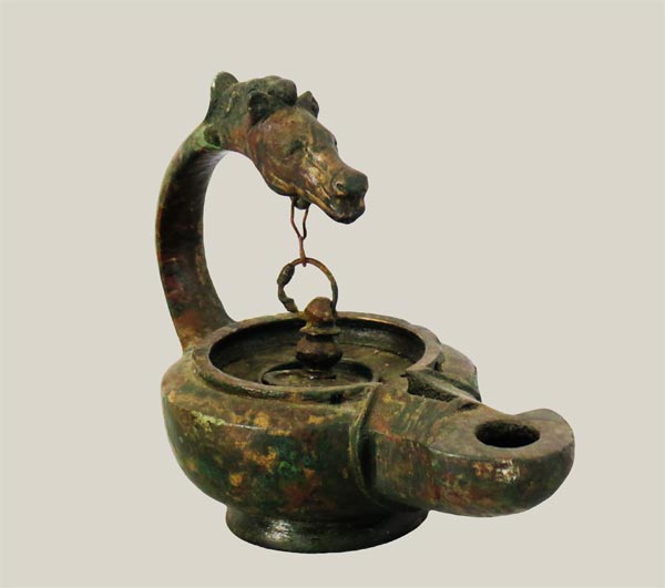 Bronze oil lamp with horse head ornament
