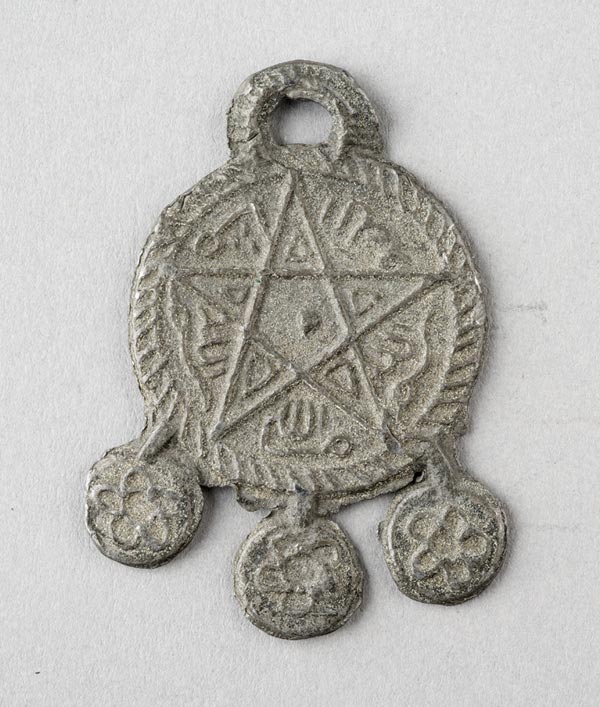 Amulet with five-pointed star, obverse