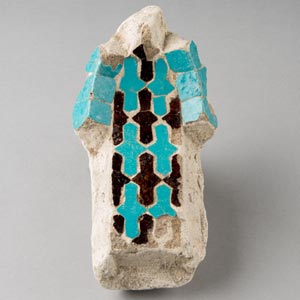 Tile mosaic <em>muqarnas</em> fragment