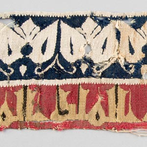 Textile with inscription band